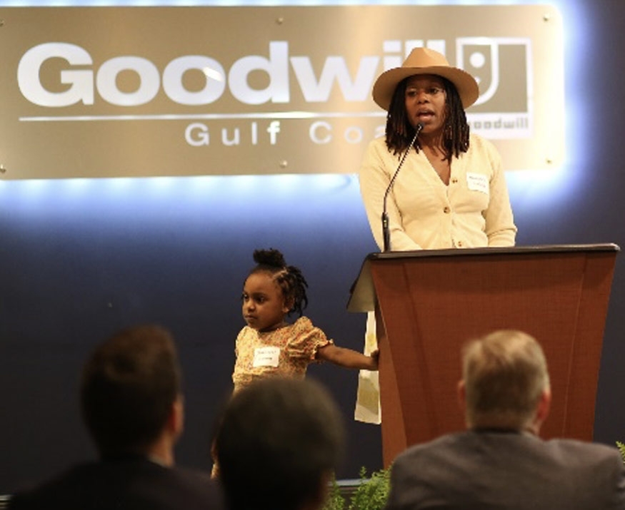 Lady speaking at podium